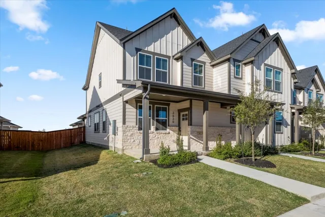 front view of a house with a yard