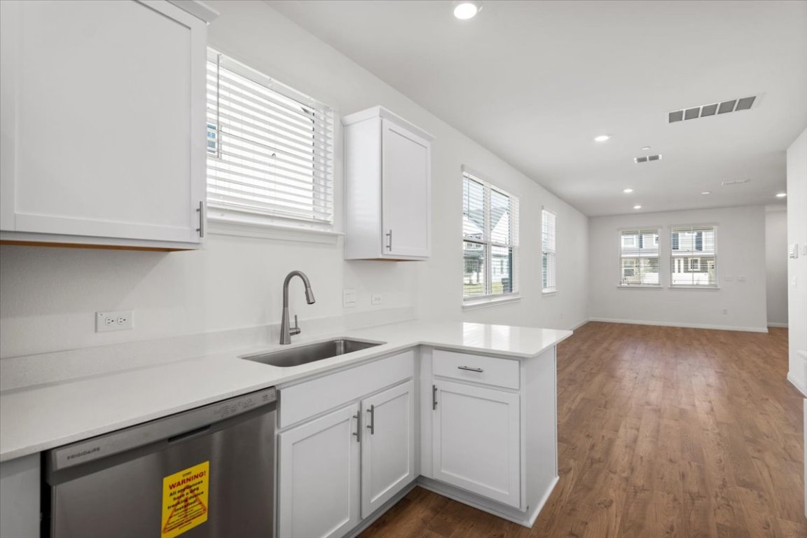 2620 Caleb Asher Loop Round Rock, TX 78665 - Photo 39 of 40 a kitchen with sink and cabinets