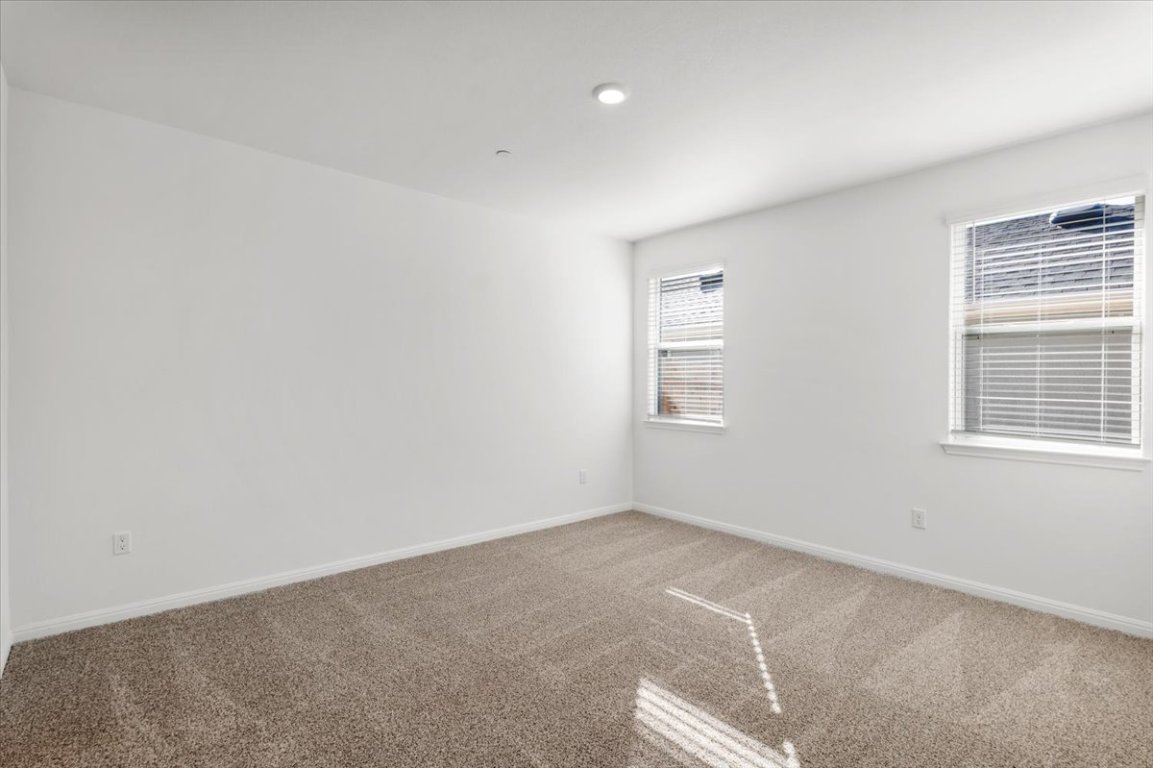 2620 Caleb Asher Loop Round Rock, TX 78665 - Photo 22 of 40 an empty room with windows