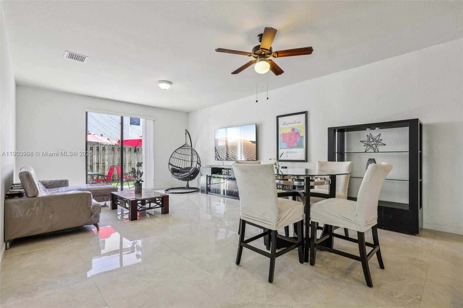 22777 Southwest 93rd Court Cutler Bay, FL 33190 - Photo 12 of 54 a living room with furniture