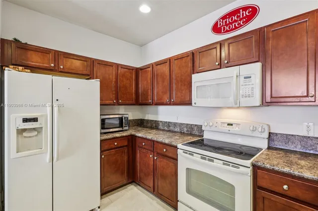 a bathroom with a shower and toilet
