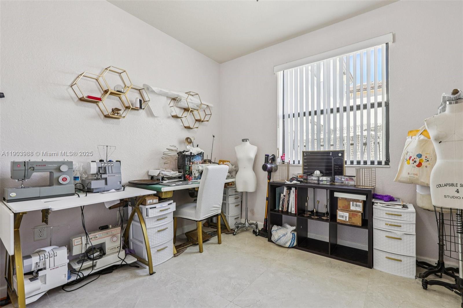 22777 Southwest 93rd Court Cutler Bay, FL 33190 - Photo 23 of 54 a view of a room with workspace and a window