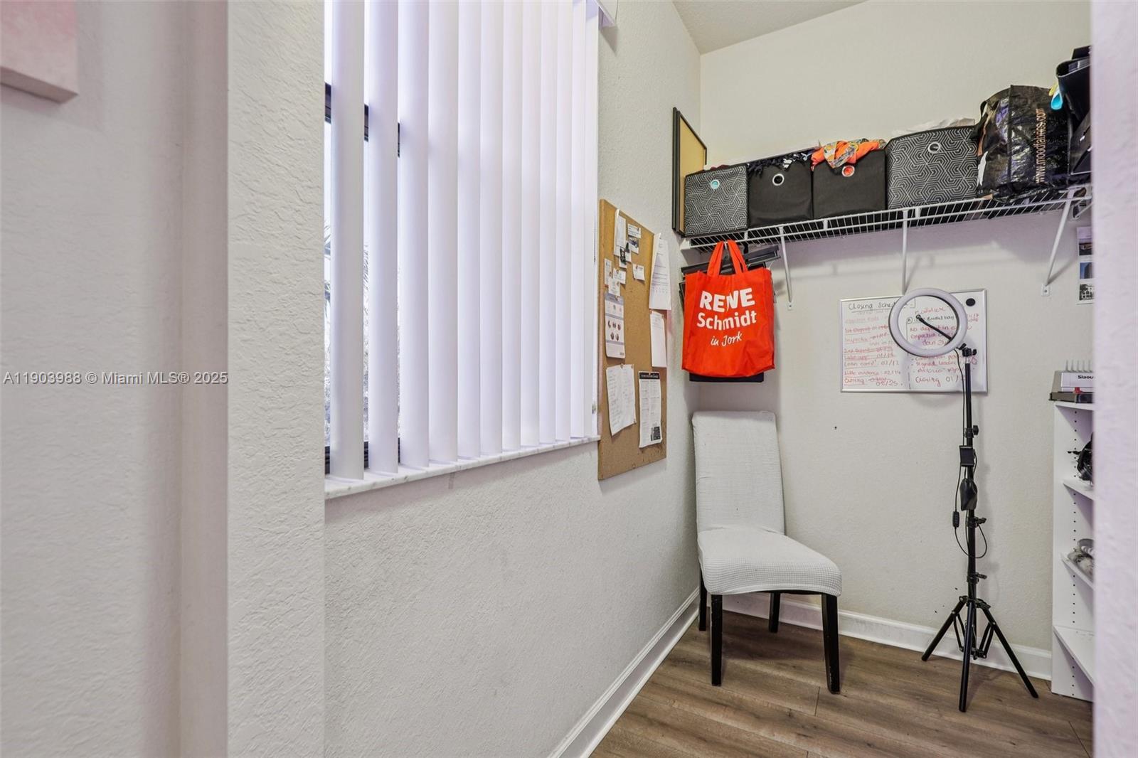 22777 Southwest 93rd Court Cutler Bay, FL 33190 - Photo 39 of 54 a front view of a house with entryway and wooden floor