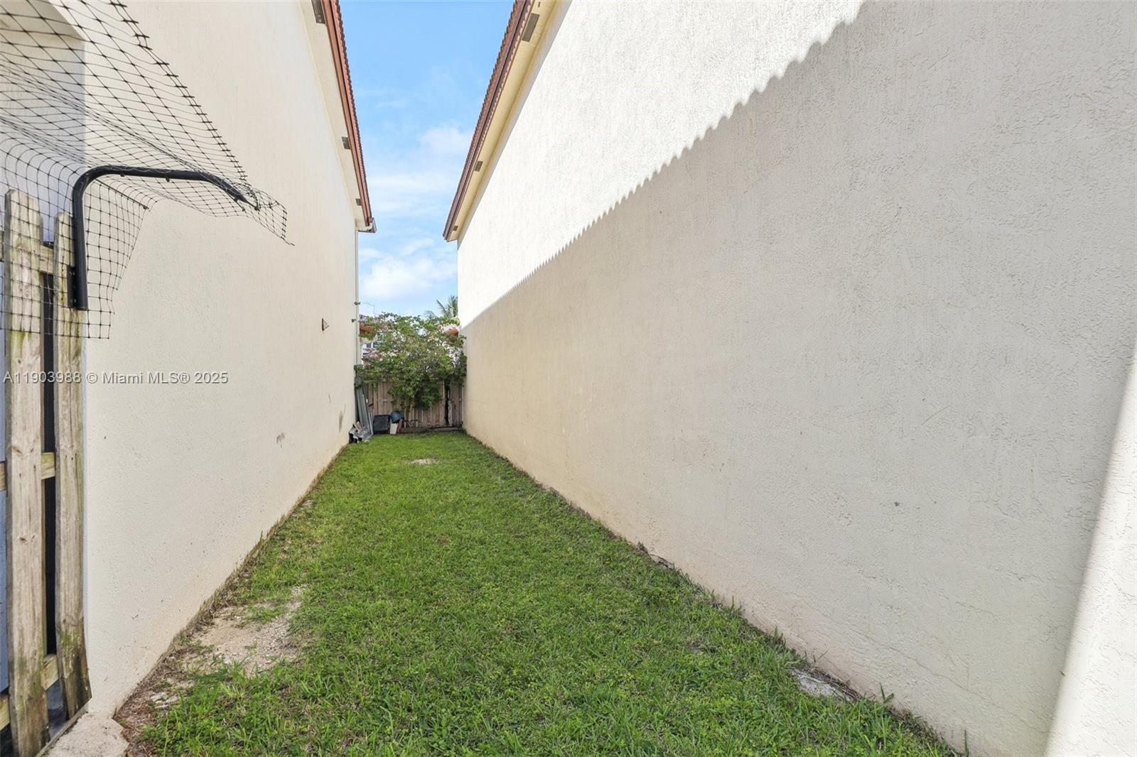 22777 Southwest 93rd Court Cutler Bay, FL 33190 - Photo 42 of 54 a view of a backyard