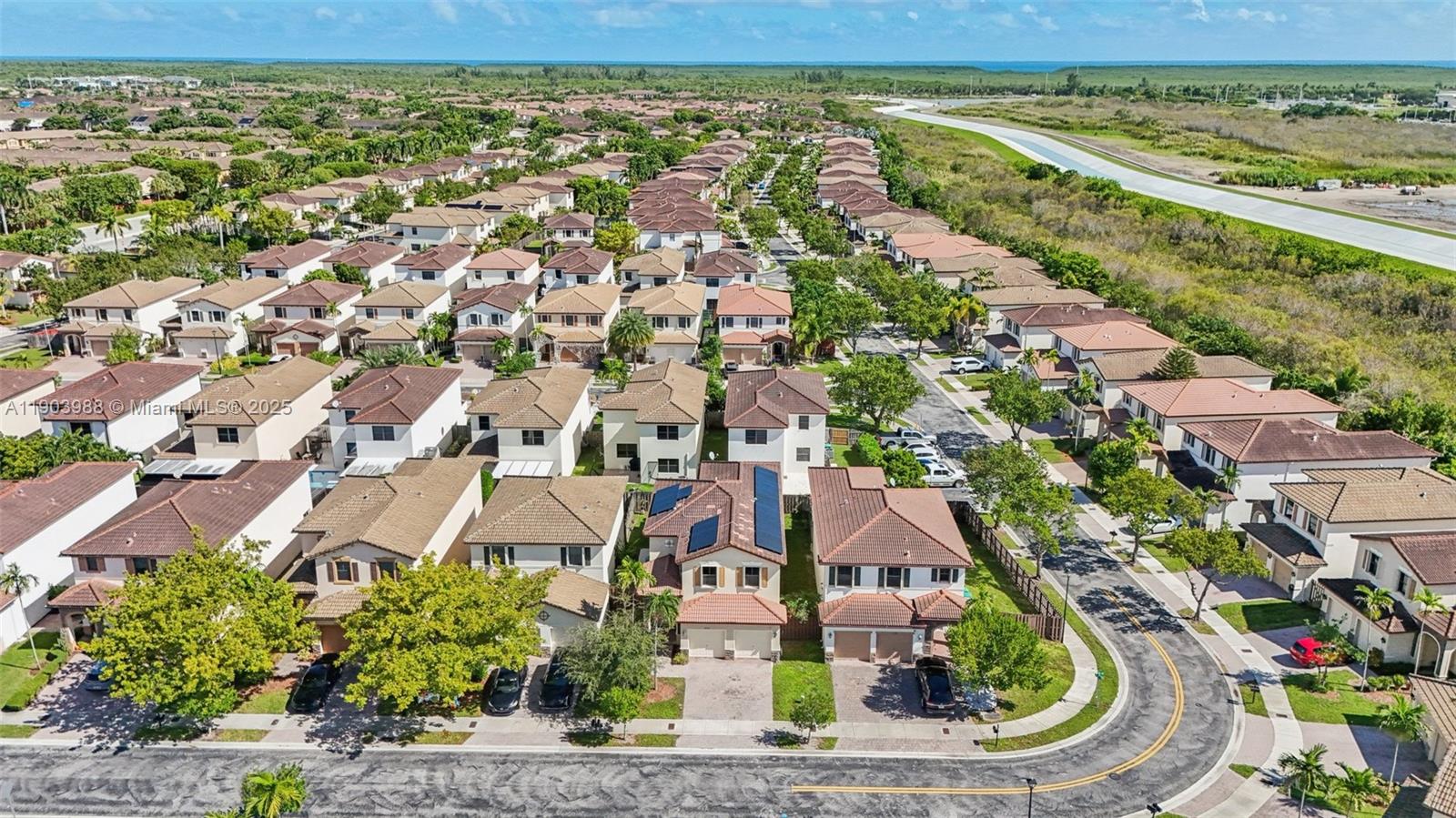 22777 Southwest 93rd Court Cutler Bay, FL 33190 - Photo 53 of 54 an aerial view of residential houses with outdoor space and river