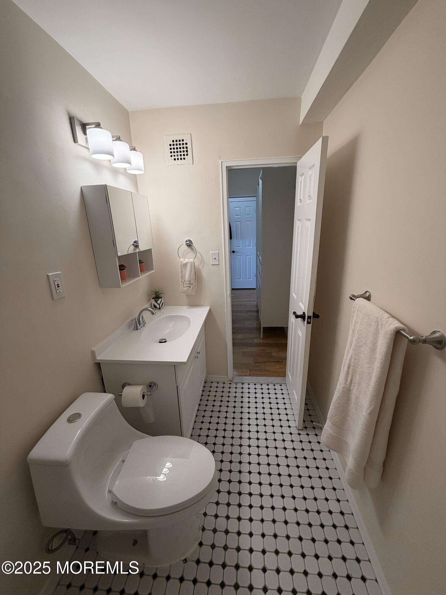 1225 John F. Kennedy Boulevard, Unit 8I Bayonne, NJ 07002 - Photo 15 of 18 a bathroom with a sink toilet and shower
