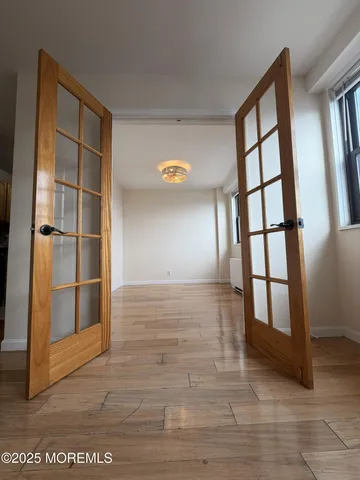 a view of an empty room and window