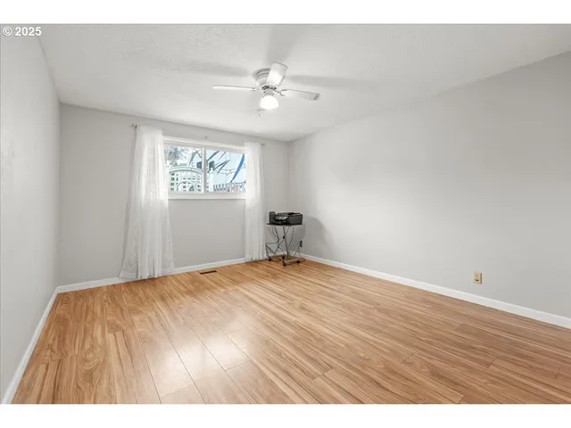 a view of a livingroom with a window