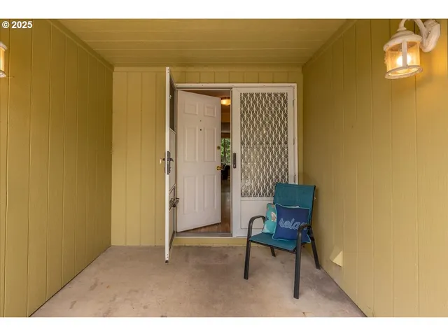 a chair and a table in a room