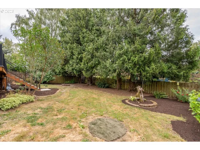 a view of a pathway with outside area of the house