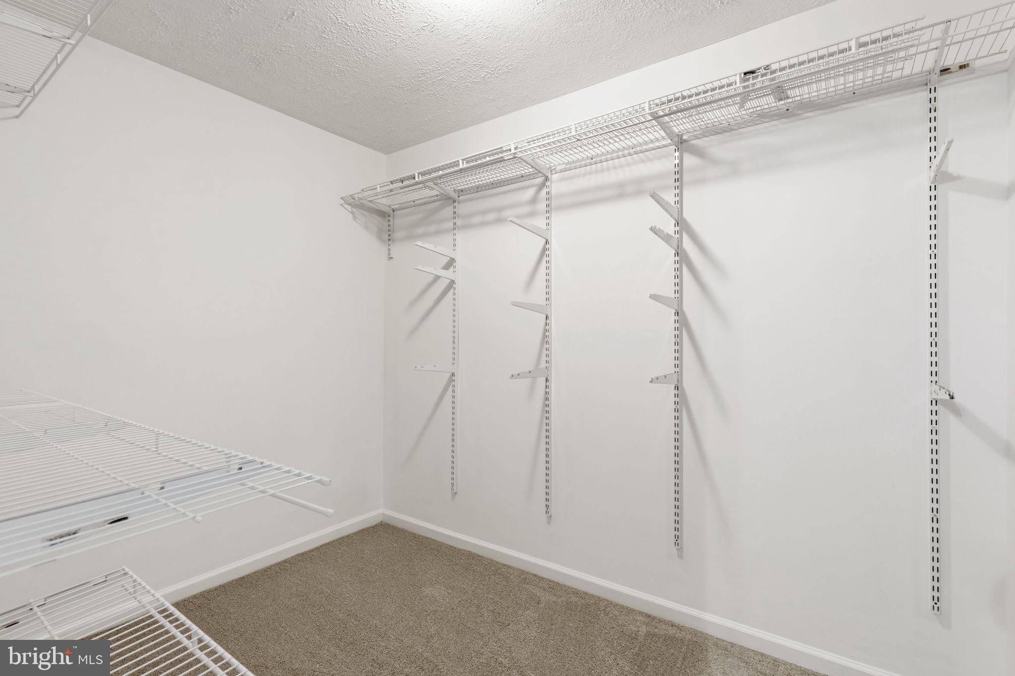 3172 Hidden Ridge Terrace Abingdon, MD 21009 - Photo 15 of 34 a view of a room with racks on the wall