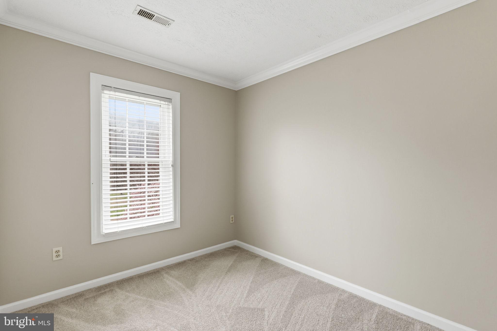 3172 Hidden Ridge Terrace Abingdon, MD 21009 - Photo 18 of 34 an empty room with a window