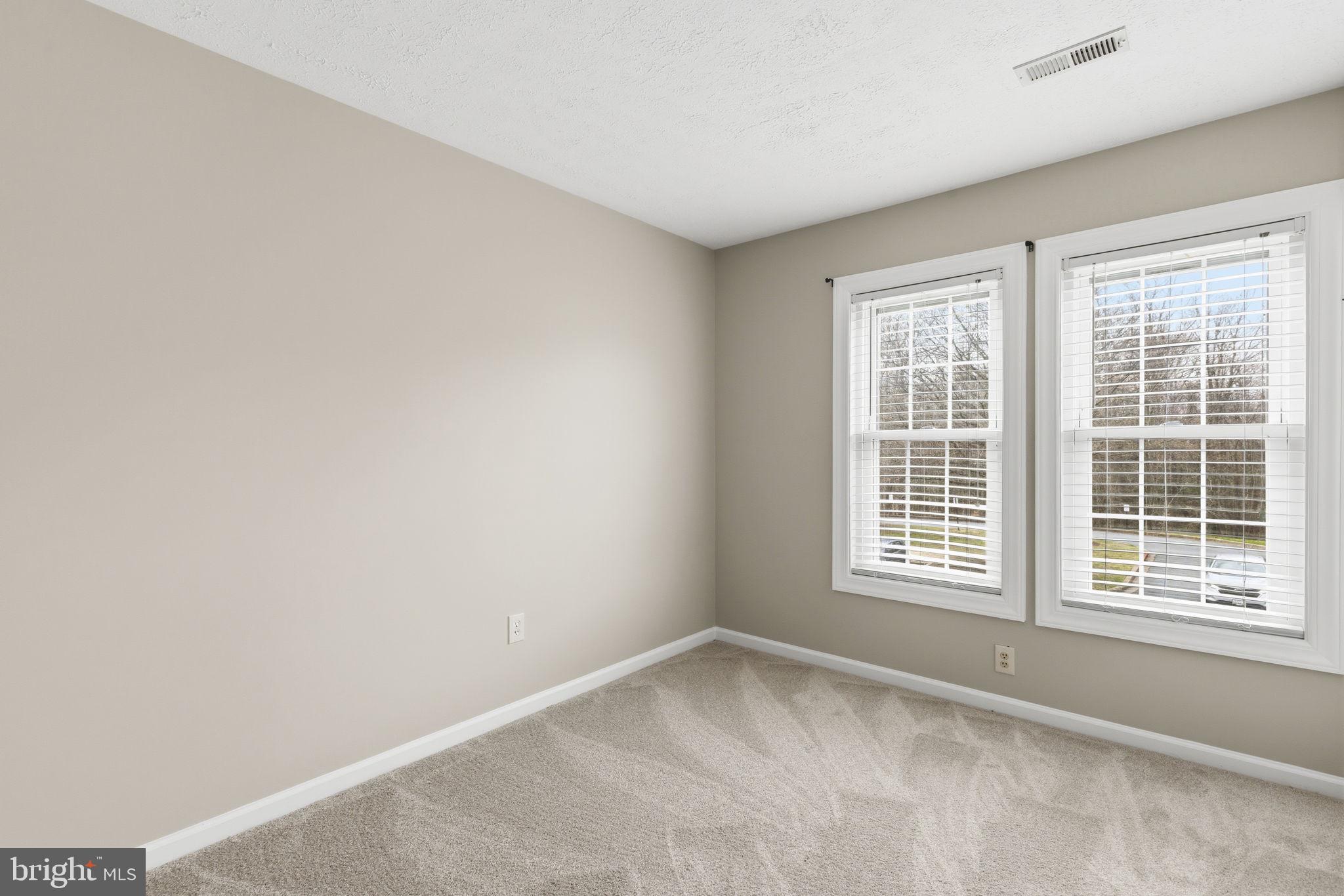3172 Hidden Ridge Terrace Abingdon, MD 21009 - Photo 20 of 34 an empty room with a window