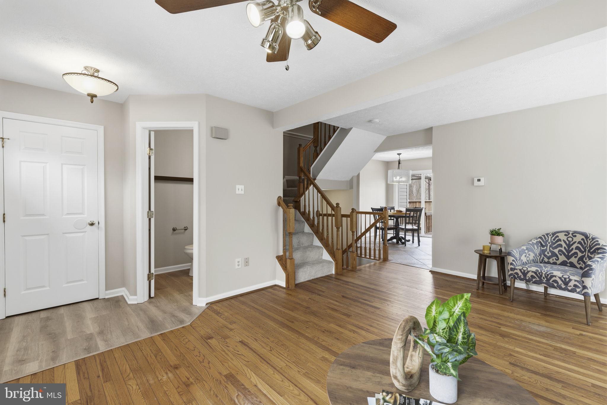 3172 Hidden Ridge Terrace Abingdon, MD 21009 - Photo 5 of 34 a living room with furniture and a wooden floor