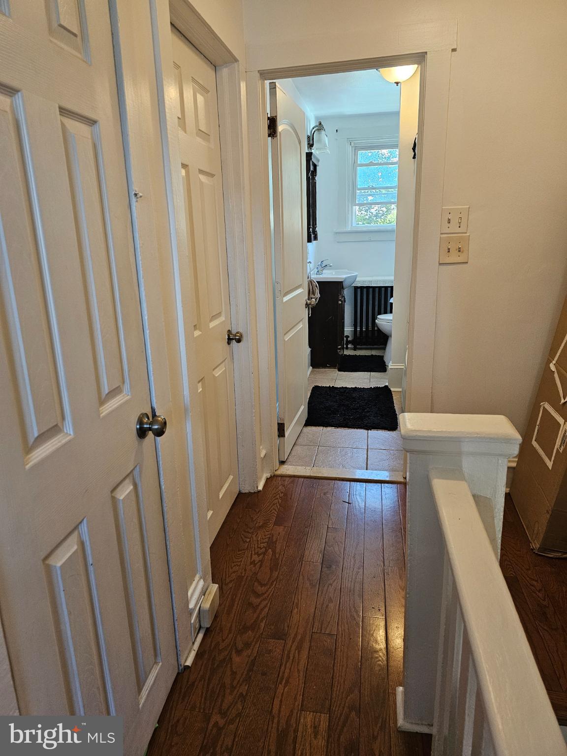 40 North Penn Street Aldan, PA 19018 - Photo 12 of 21 a view of a hallway view with wooden floor and staircase