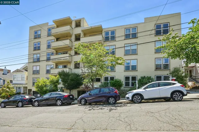 a view of a car parked in front of a building