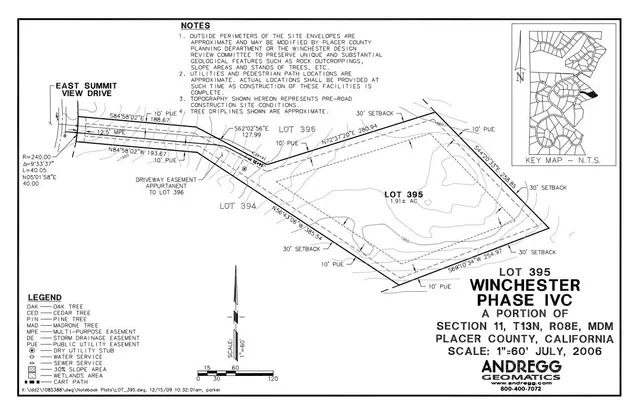 a view of a swimming pool with a yard and trees around