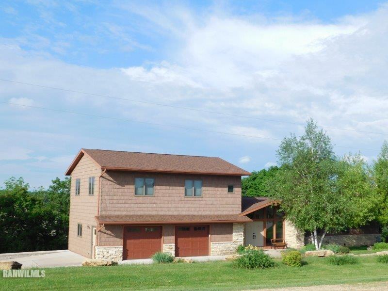 1816 County Road Freeport, WI 61032 - Photo 1 of 3 a front view of a house with garden