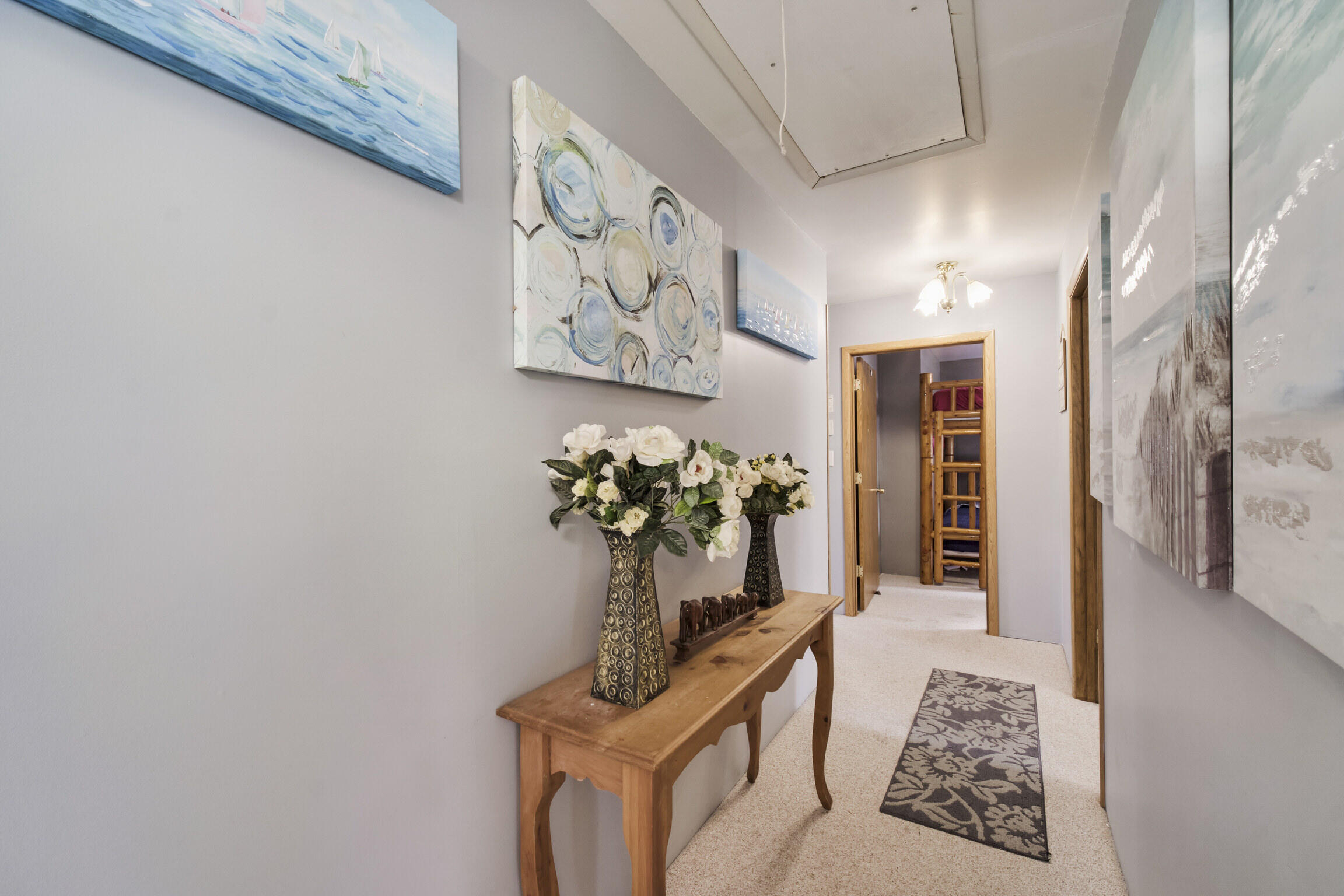 6665 Lakeshore Road Manistee, MI 49660 - Photo 29 of 50 Upper Hallway