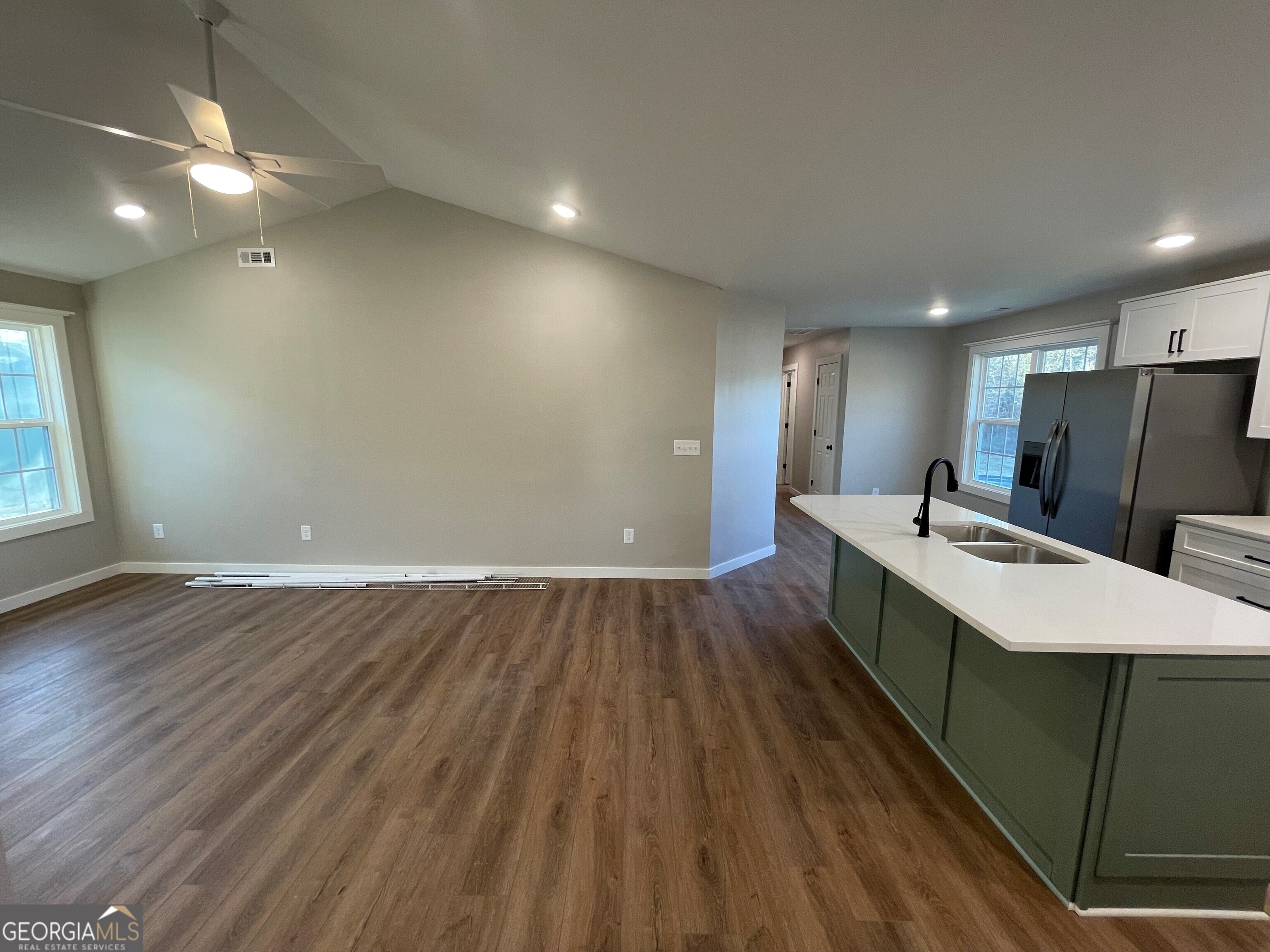 410 Hardy Avenue Southwest Rome, GA 30161 - Photo 13 of 36 a large white kitchen with wooden floor