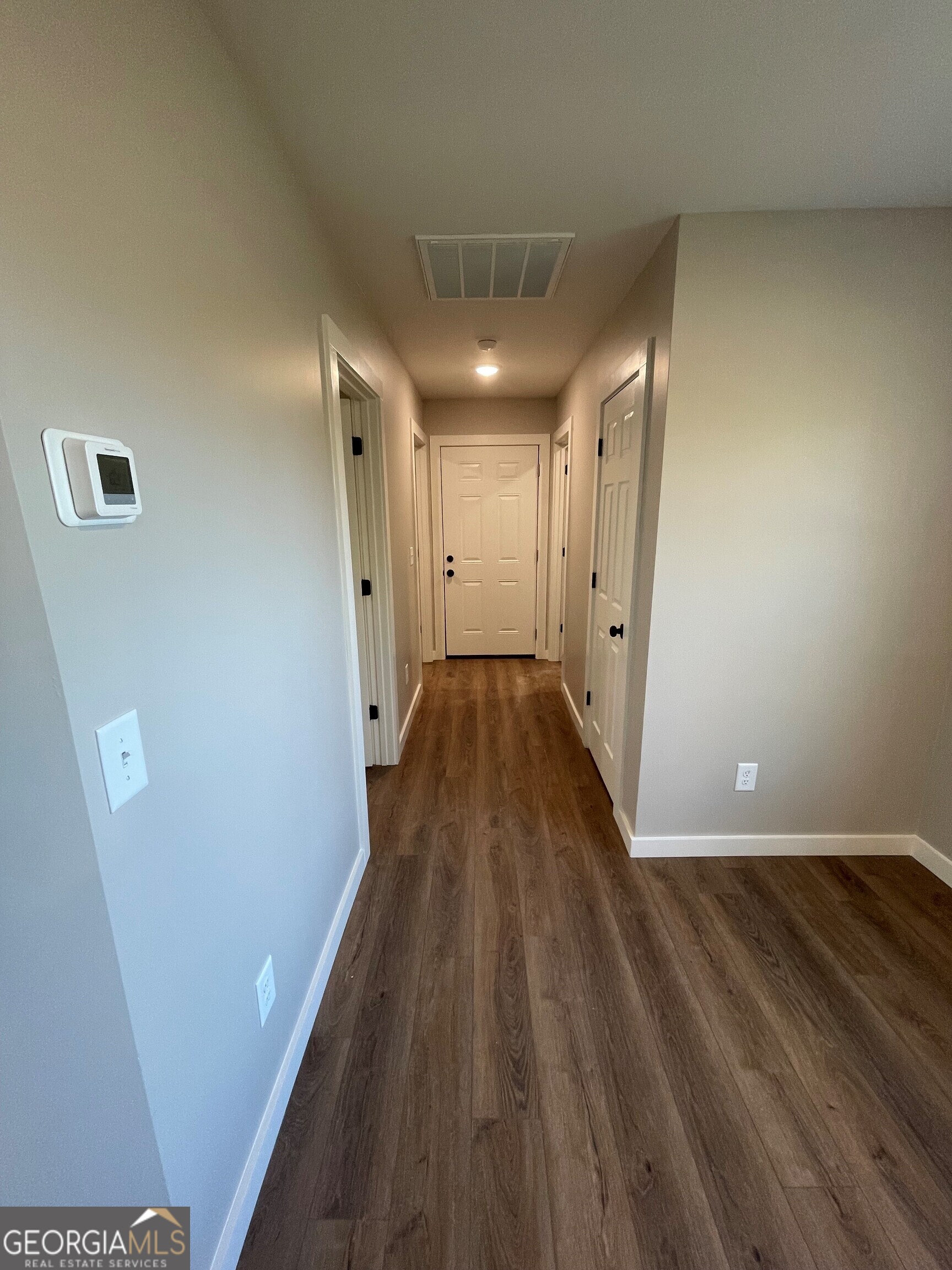 410 Hardy Avenue Southwest Rome, GA 30161 - Photo 23 of 36 a view of a hallway with wooden floor