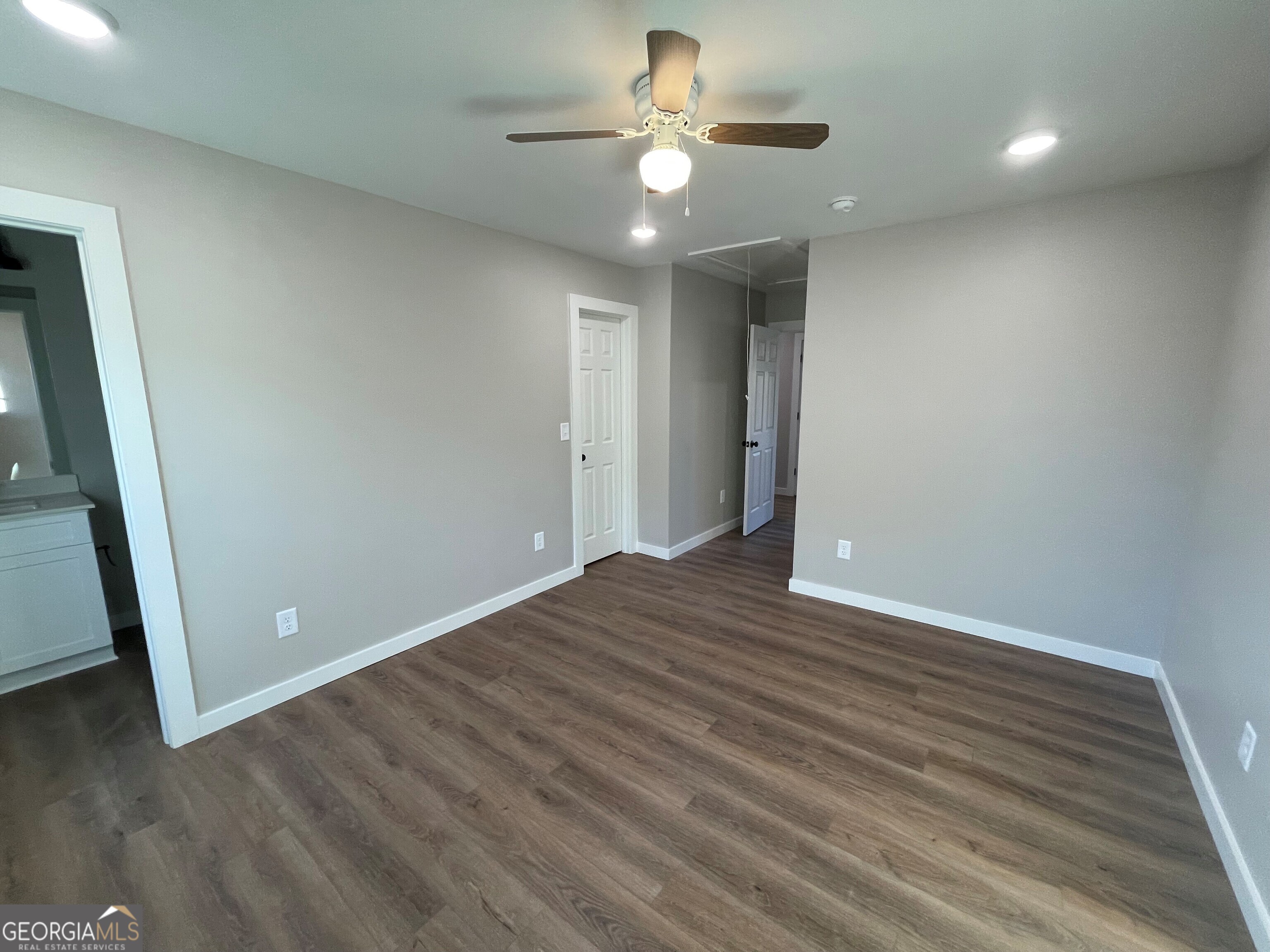 410 Hardy Avenue Southwest Rome, GA 30161 - Photo 25 of 36 wooden floor in an empty room with a window