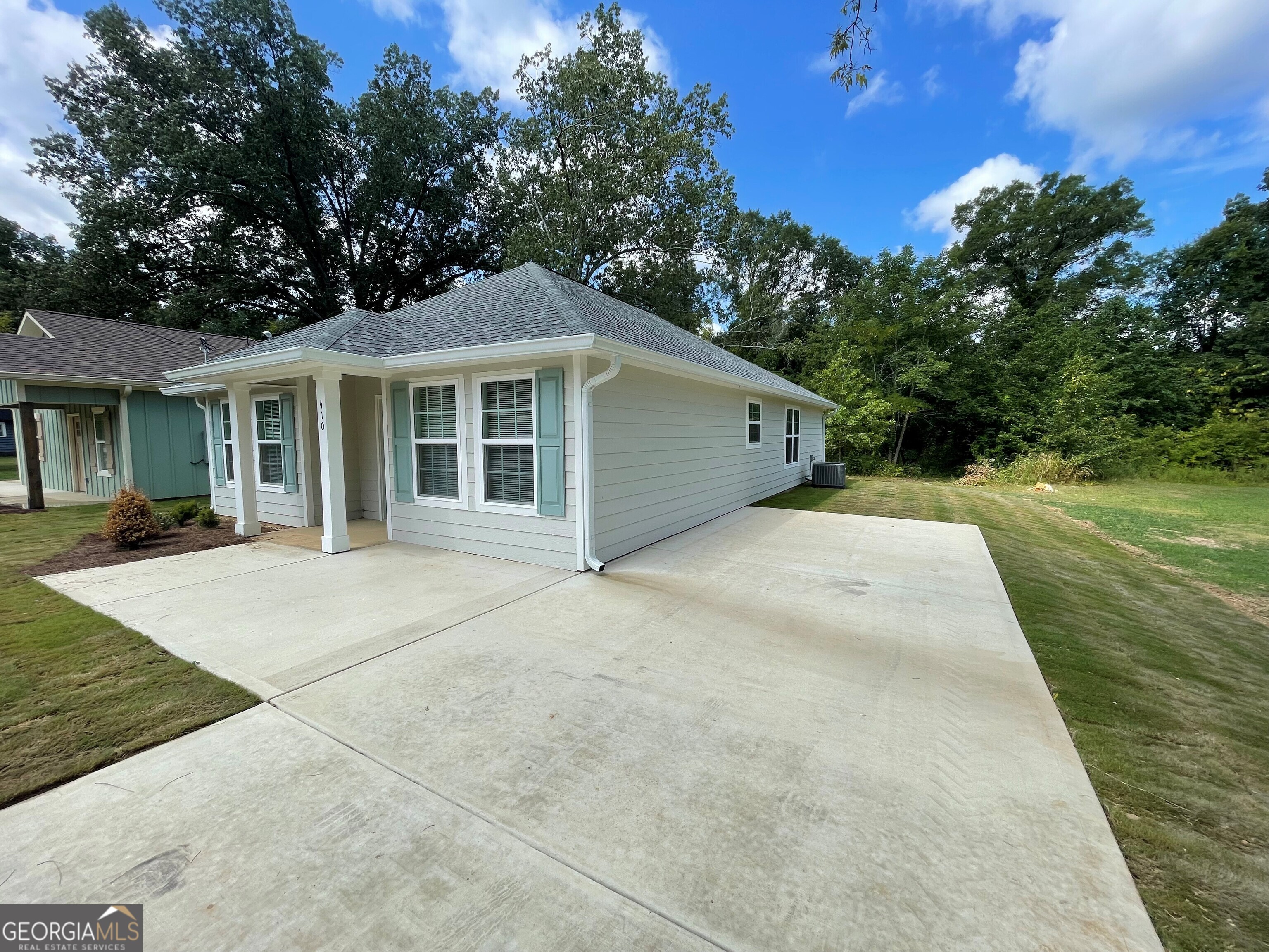 410 Hardy Avenue Southwest Rome, GA 30161 - Photo 34 of 36 a house with yard in front of it