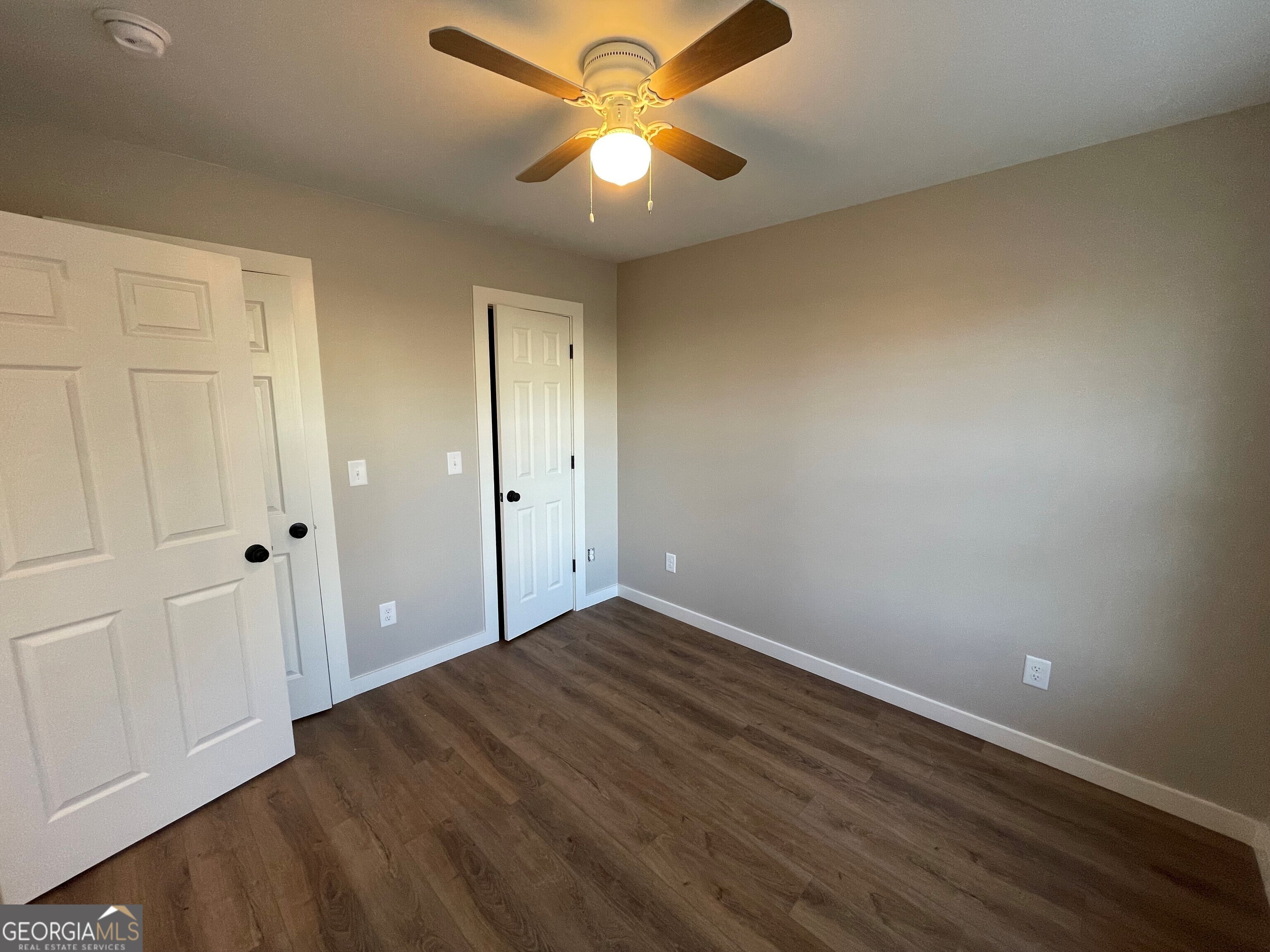 410 Hardy Avenue Southwest Rome, GA 30161 - Photo 6 of 36 wooden floor in an empty room