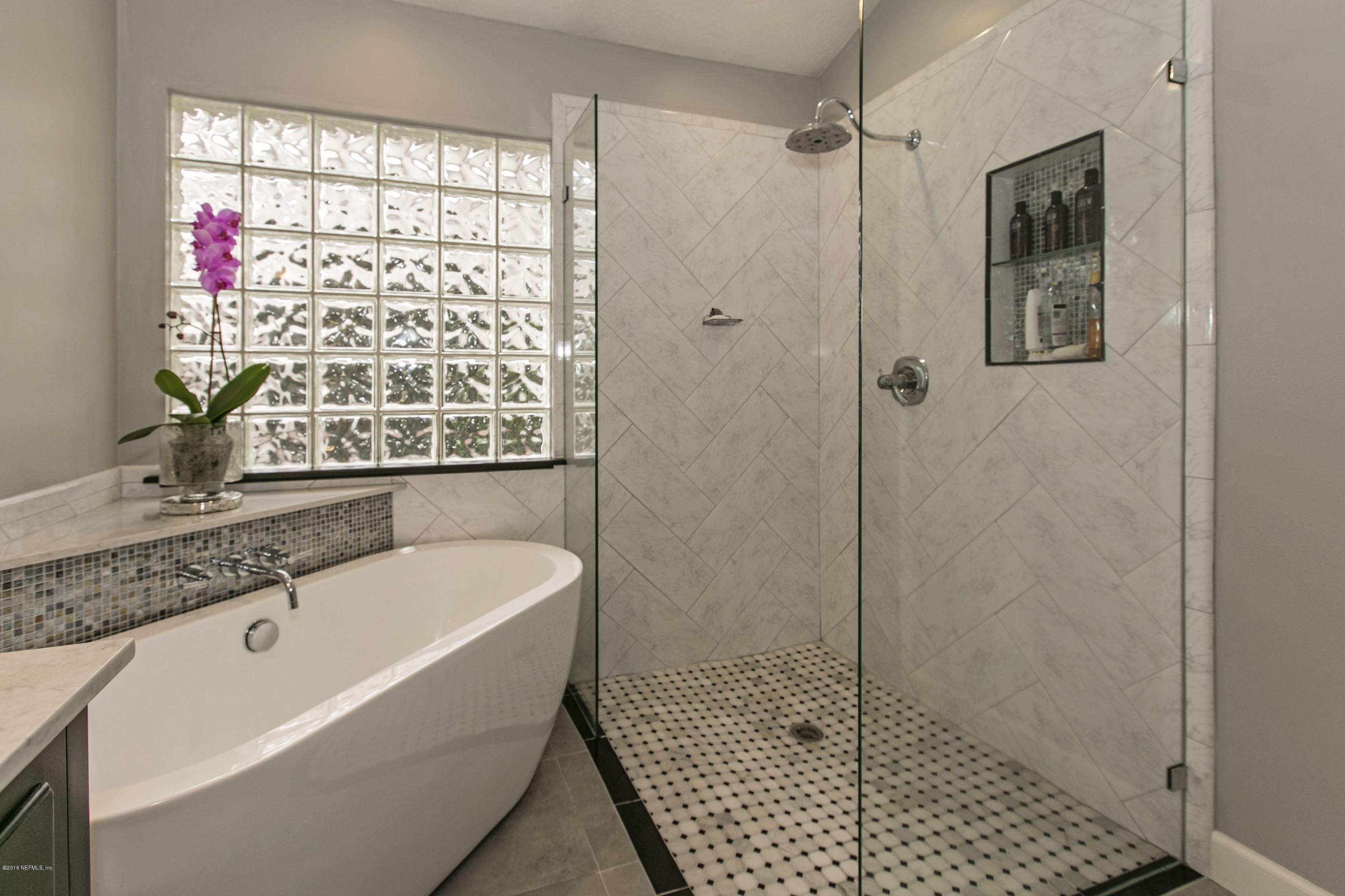 445 Big Tree Road Ponte Vedra Beach, FL 32082 - Photo 15 of 23 a bathroom with a bathtub and shower