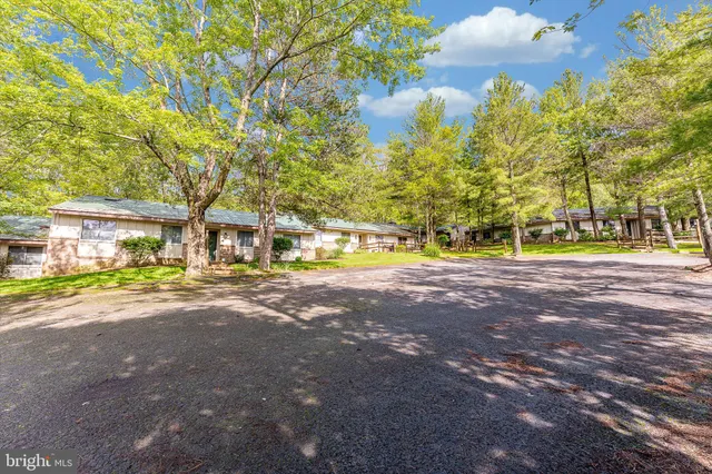 a view of a street with houses on both side