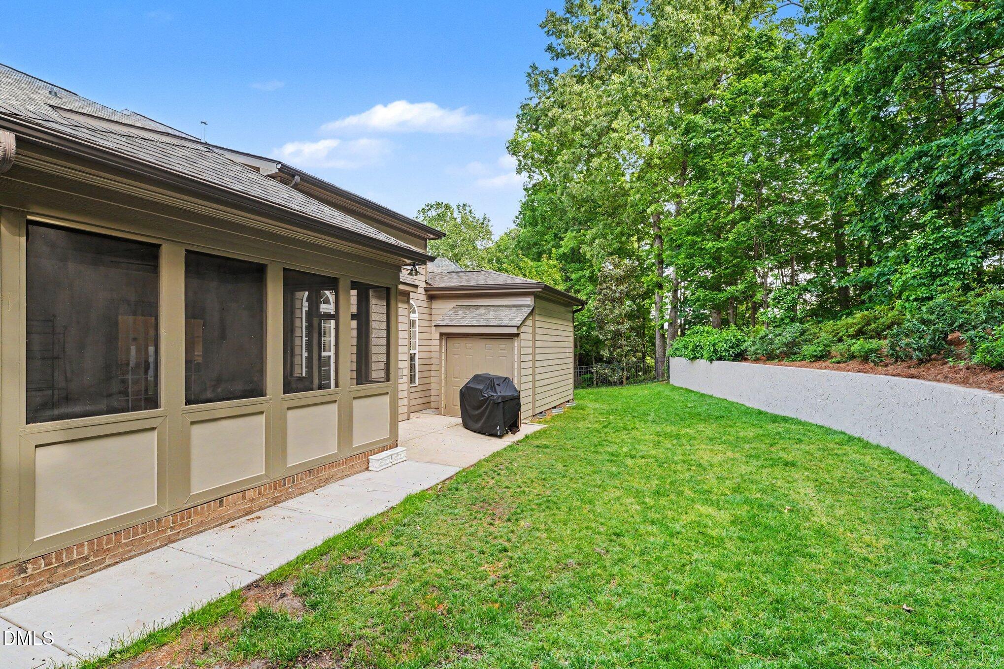 1729 Frenchwood Drive Raleigh, NC 27612 - Photo 39 of 46 a view of a back yard of the house