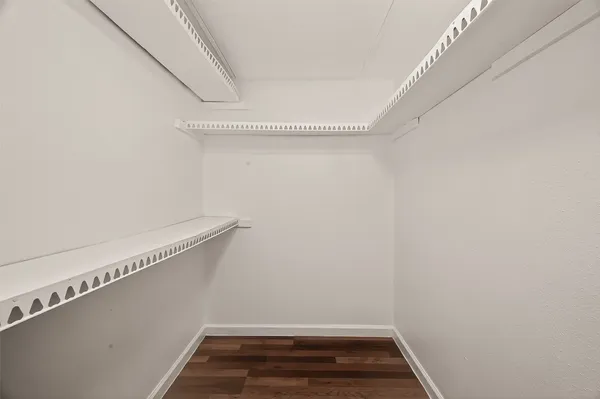 a view of small space with racks on the wall