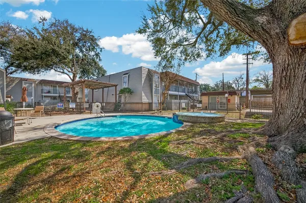 a view of a yard in front of a house