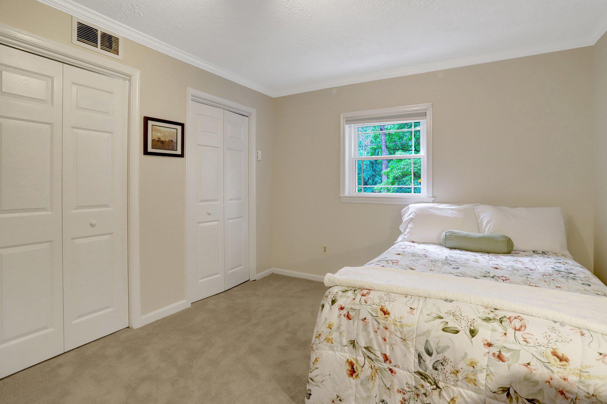7506 Oriole Avenue Springfield, VA 22150 - Photo 43 of 67 a bedroom with a bed and a window