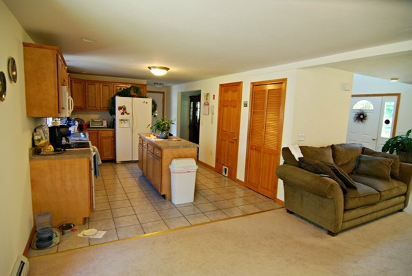 95 South Road Templeton, MA 01436 - Photo 8 of 26 a living room with furniture a window and gym equipment