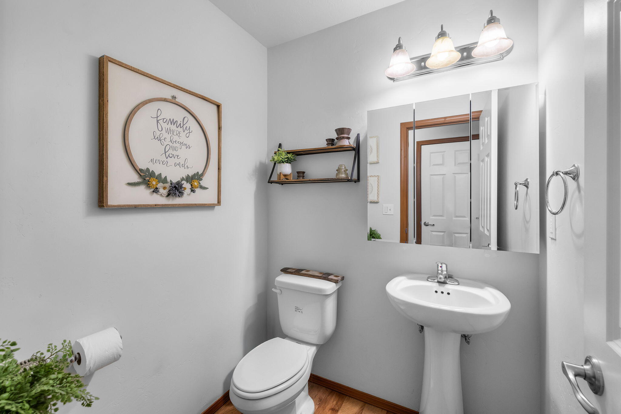 63639 Gentry Loop Bend, OR 97701 - Photo 15 of 40 a bathroom with a toilet a sink and mirror