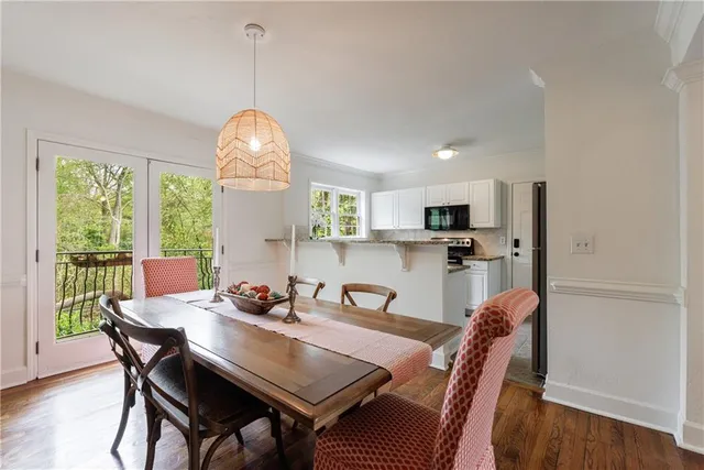 a kitchen with a sink stove and microwave