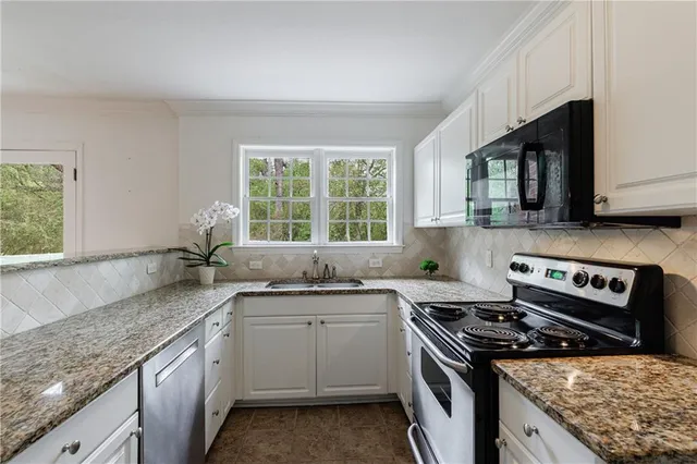 a white refrigerator freezer and a wooden cabinets