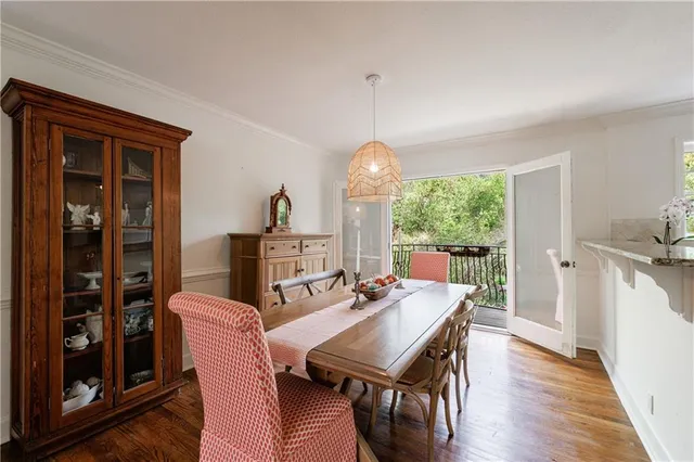 a view of balcony with wooden floor
