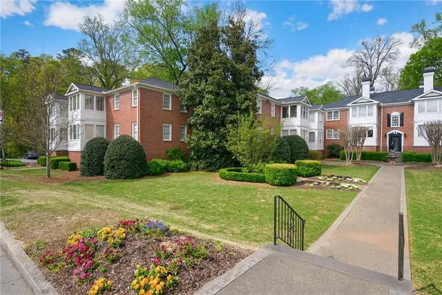 a view of a car parked in a yard