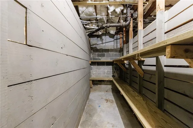 an aerial view of a house with outdoor space