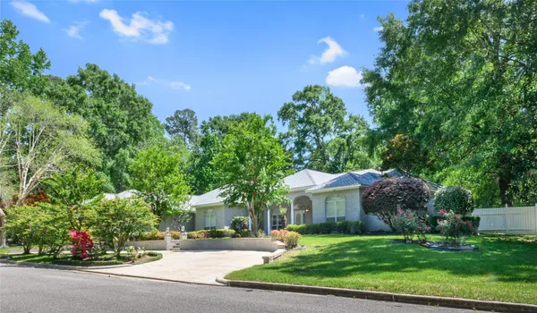 a house view with a garden space