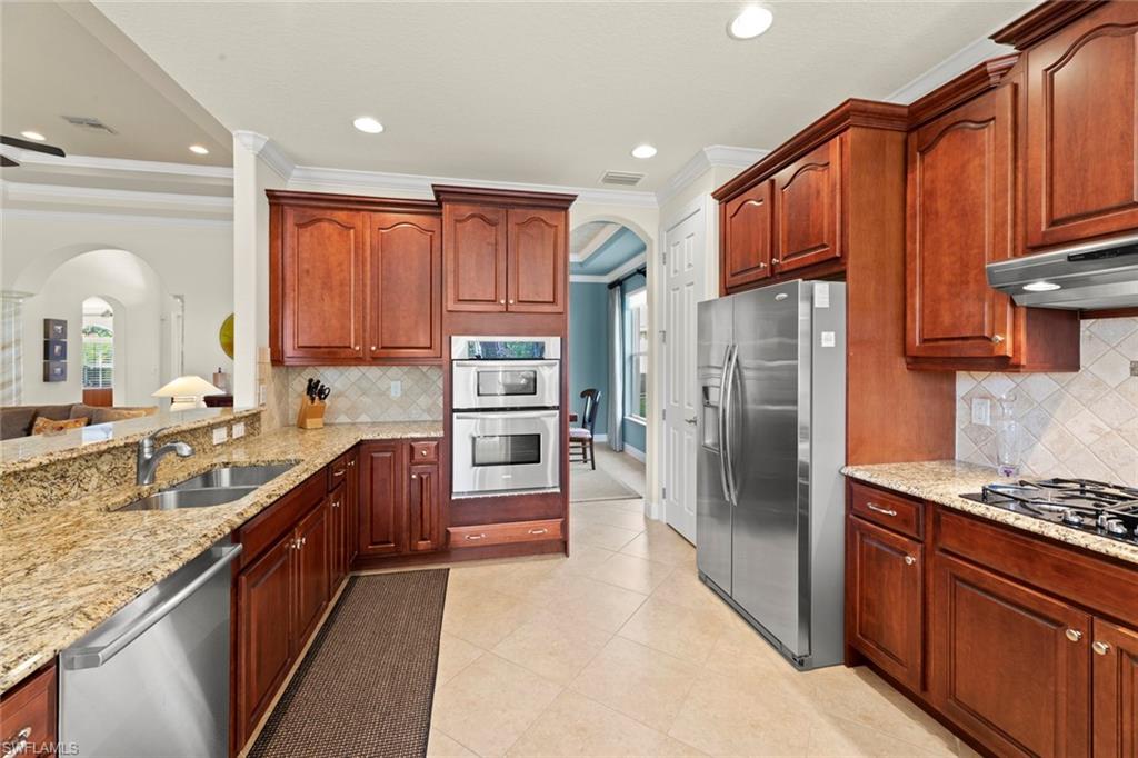 19900 Maddelena Circle Estero, FL 33967 - Photo 15 of 42 Kitchen w/ample cabinetry