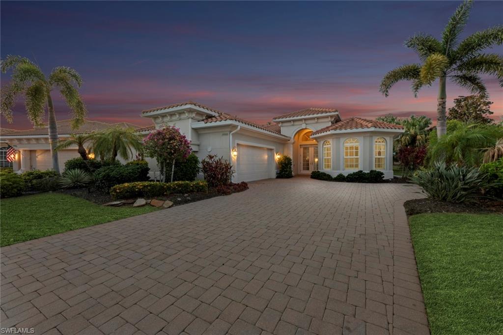 19900 Maddelena Circle Estero, FL 33967 - Photo 2 of 42 Sunset over 19900 Maddelena Cir