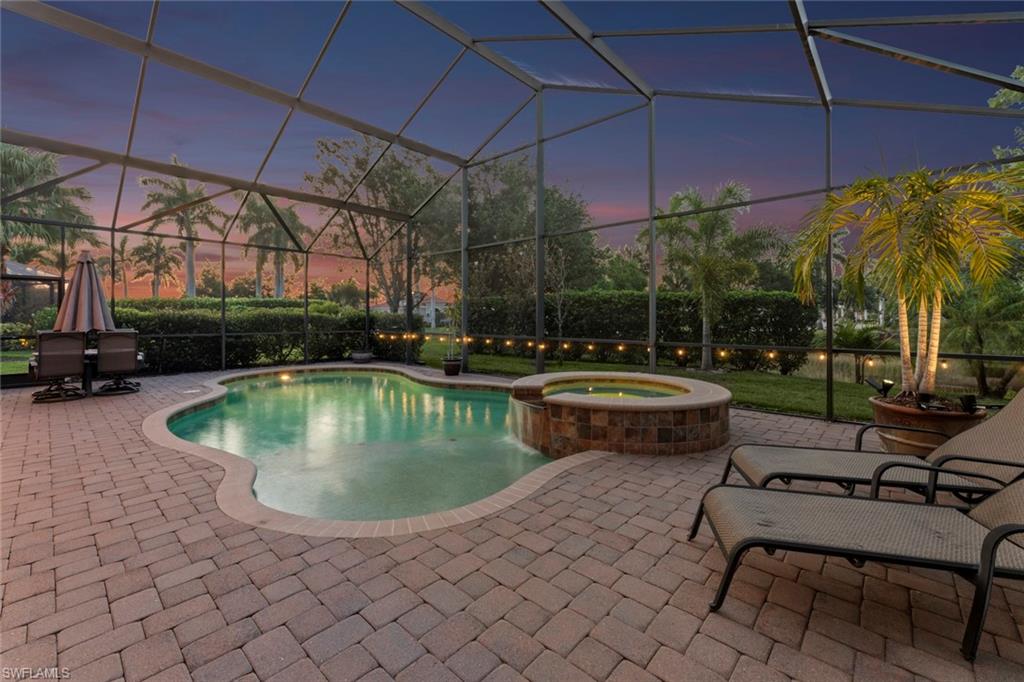 19900 Maddelena Circle Estero, FL 33967 - Photo 3 of 42 Ample space around pool to entertain