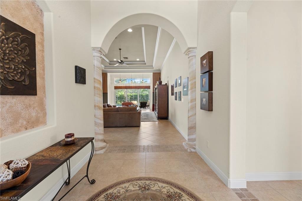 19900 Maddelena Circle Estero, FL 33967 - Photo 8 of 42 Foyer looking into great room