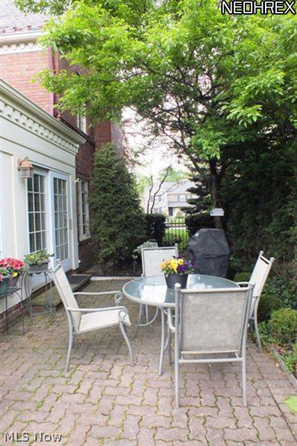 2729 Inverness Road Shaker Heights, OH 44122 - Photo 3 of 24 Beautiful stone patio at rear and side of the house - sliders from Family Room open up to it to create a tranquil courtyard setting!