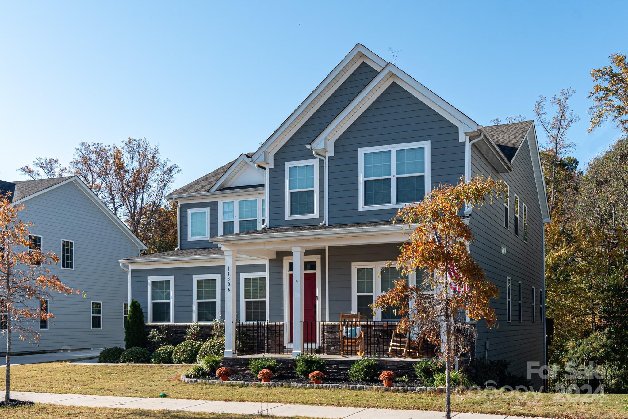 14306 Sunnyhill Grove Road Davidson, NC 28036 - Photo 1 of 35 front view of a house with a yard
