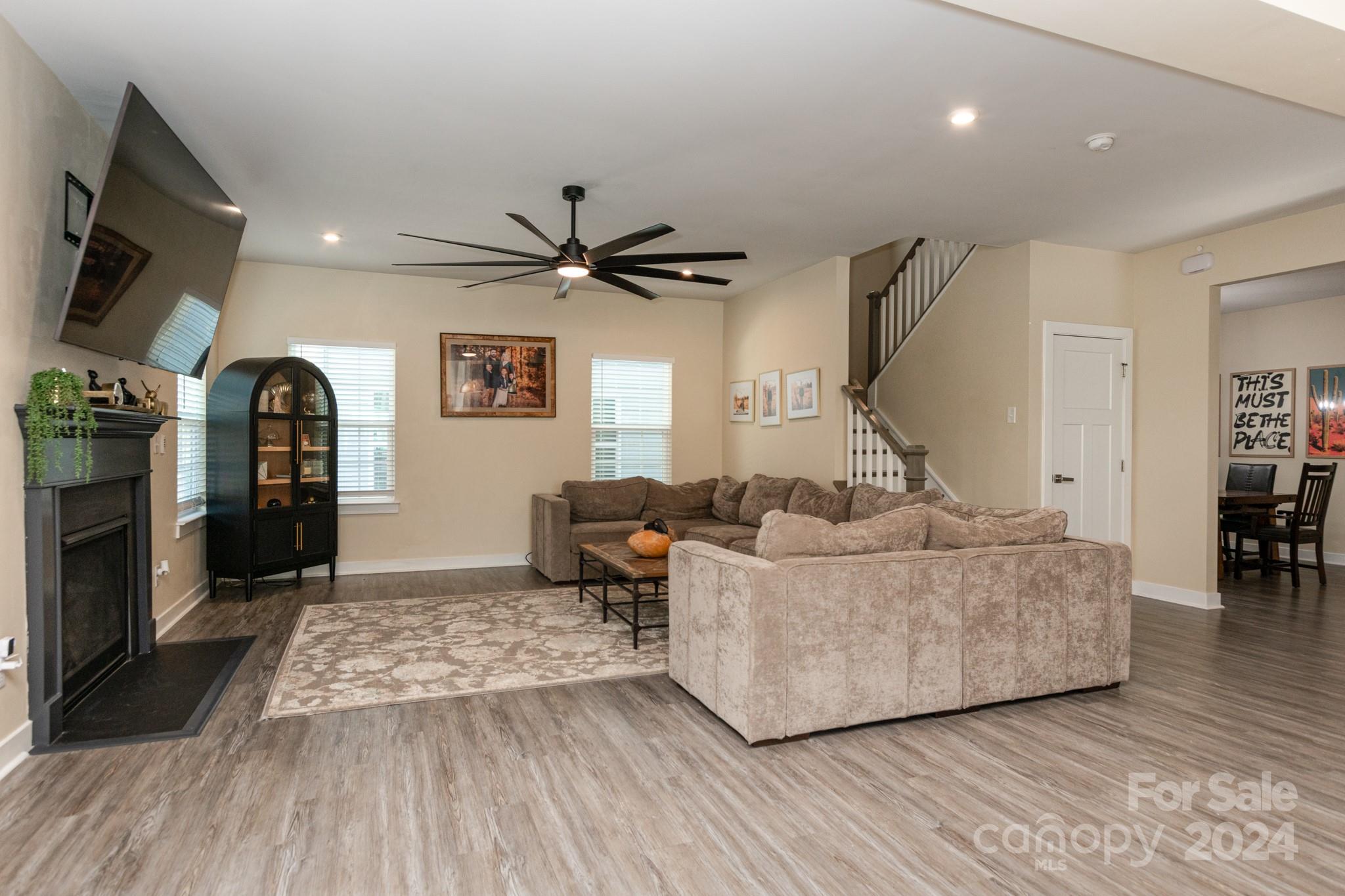 14306 Sunnyhill Grove Road Davidson, NC 28036 - Photo 11 of 35 a living room with furniture and wooden floor