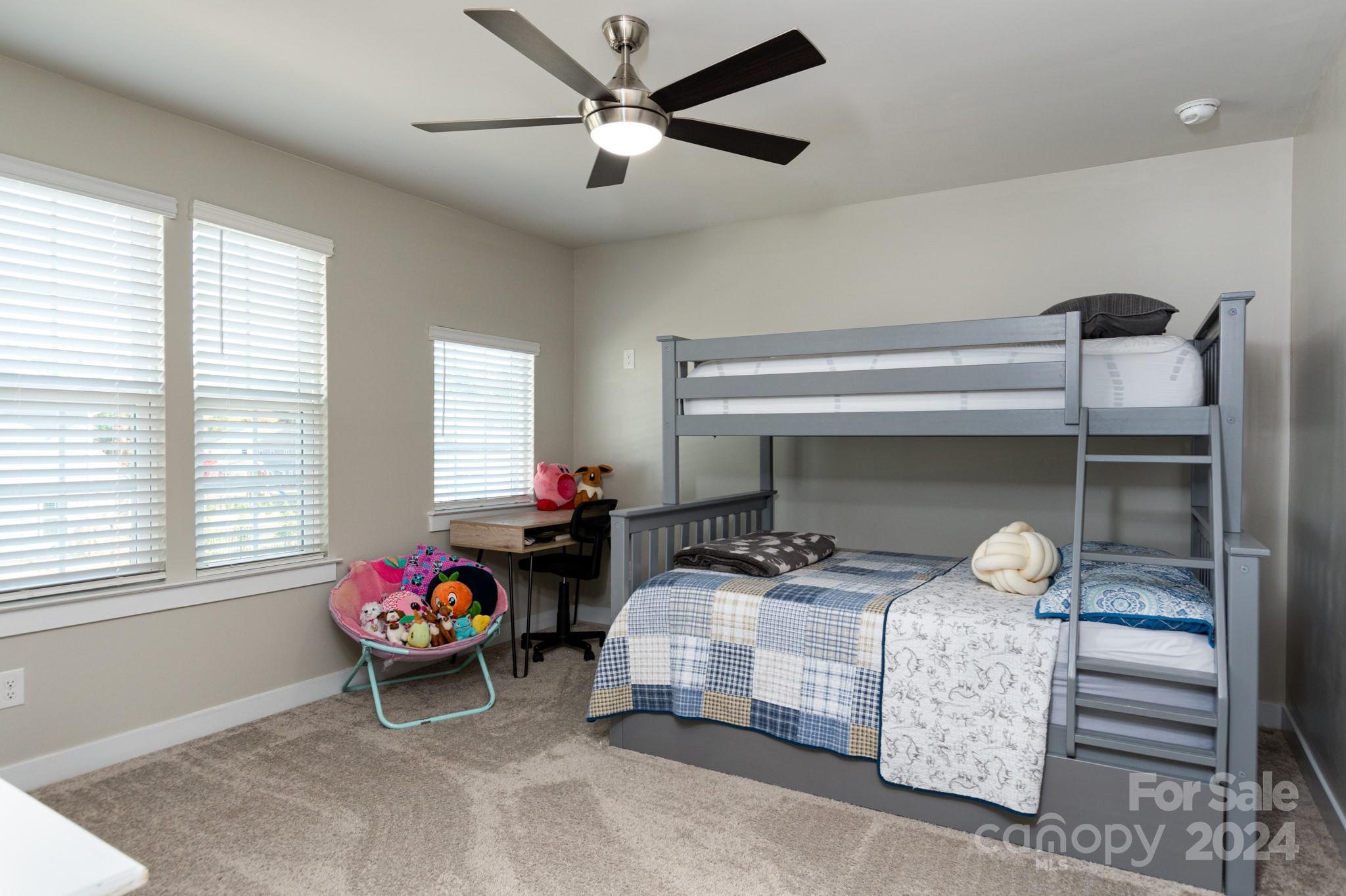 14306 Sunnyhill Grove Road Davidson, NC 28036 - Photo 20 of 35 a bedroom with furniture and a window